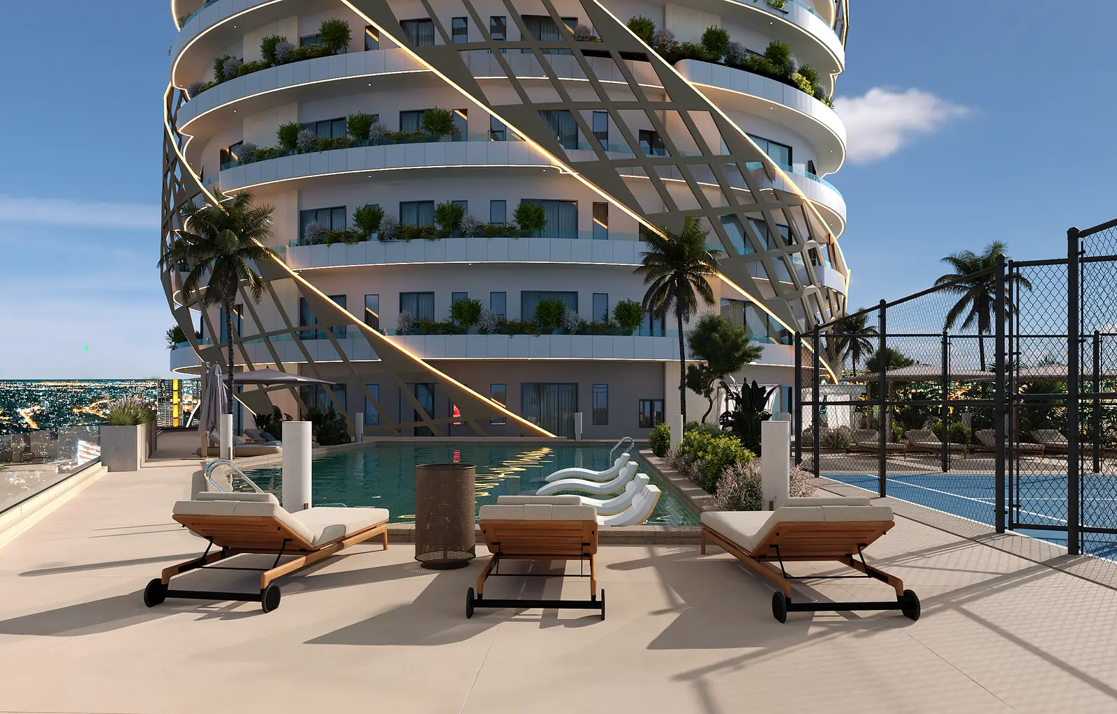Pool deck with teak loungers at the foot of the tower